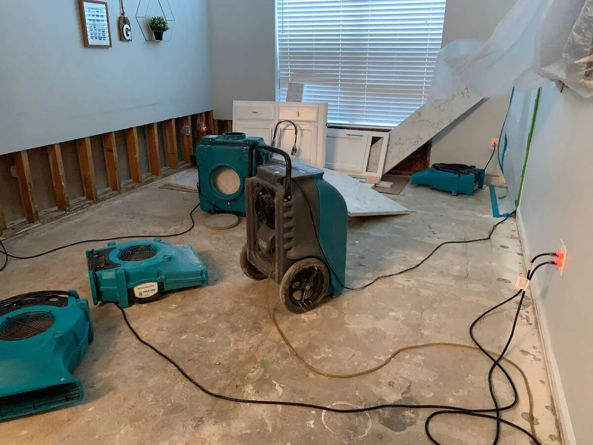 Dehumidifier in flood-cut room for Water Damage Restoration in Parlier